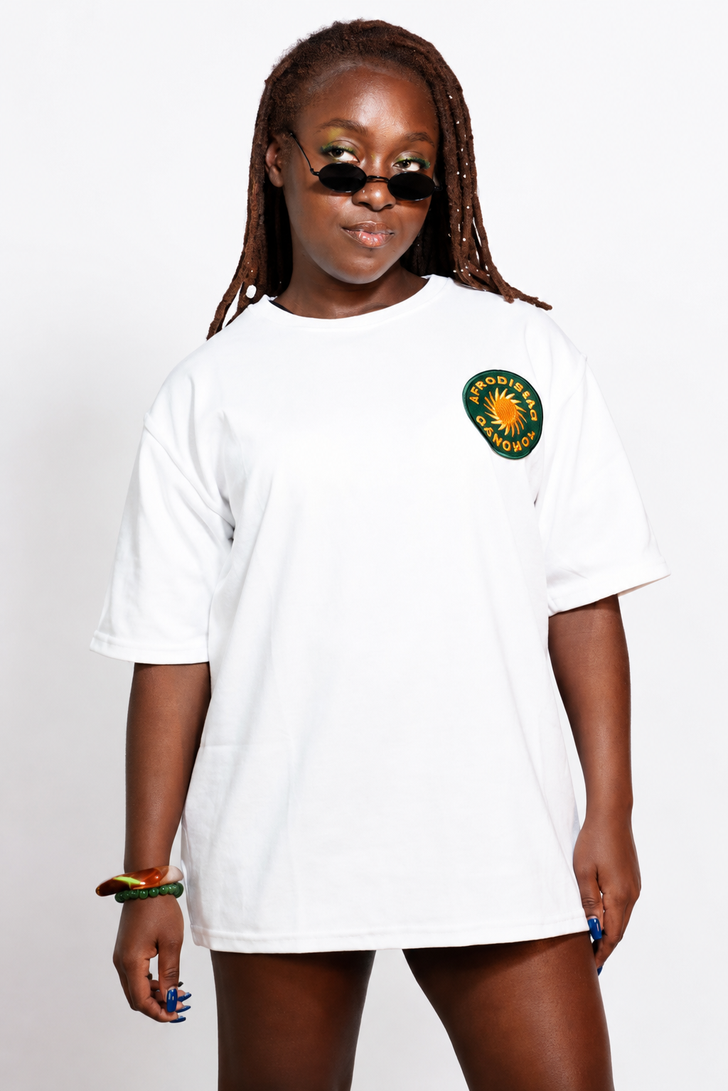  Model wearing the white Afrodisiac Toronto Tee